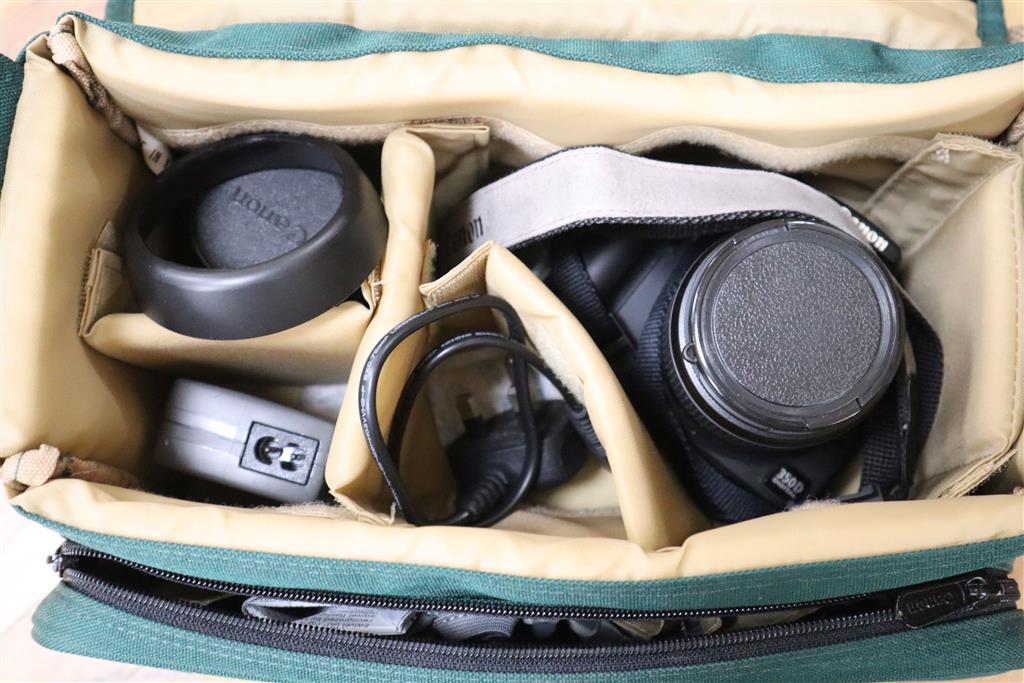 Two Canon EOS 20D digital cameras, lenses, flash guns and chargers and a Canon 350D digital camera